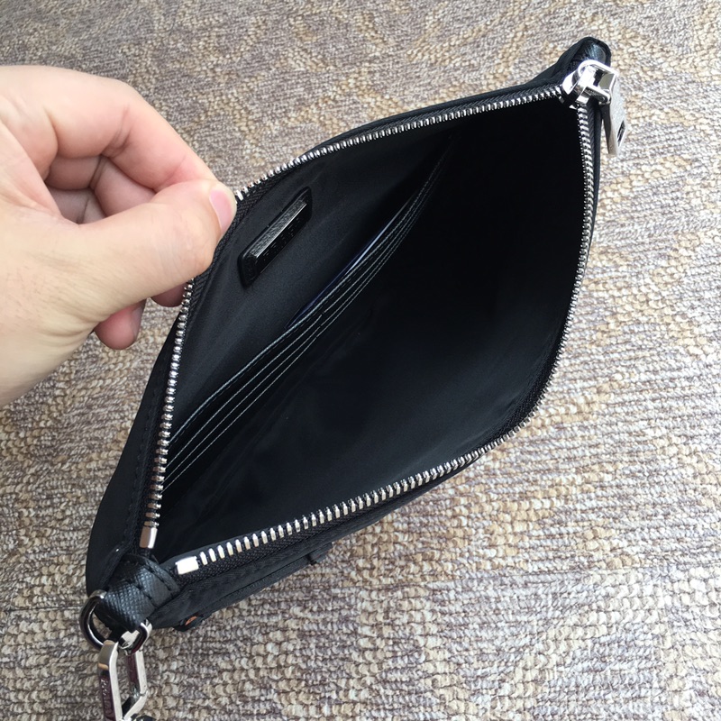 Pra*a clutch bags